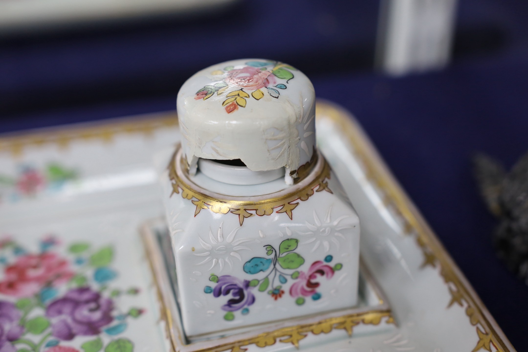 A Samson Paris inkstand and a porcelain box and cover and a porcelain model of a Scots terrier, inkstand 26cms wide